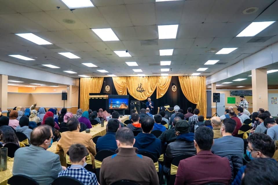 Families and community members attending an IAC program