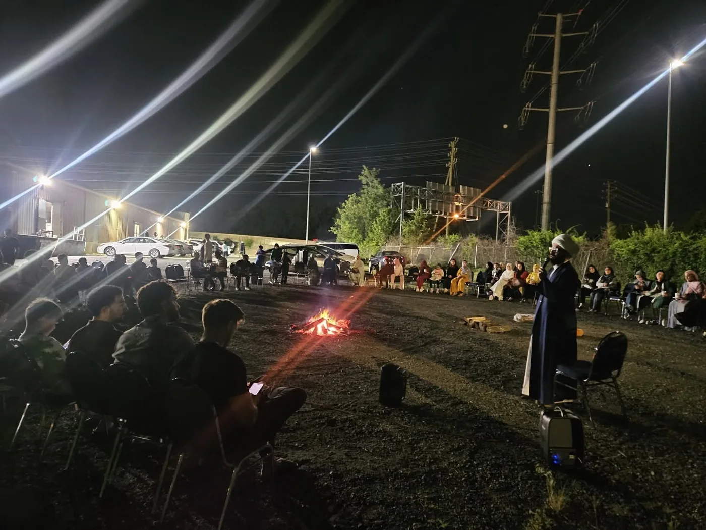 The IAC community gathered outdoors for an evening program
