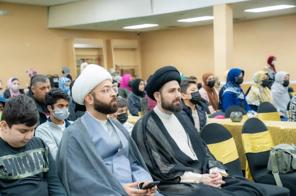 Community members celebrating the birth anniversaries of Imam Ali and Imam Jawad